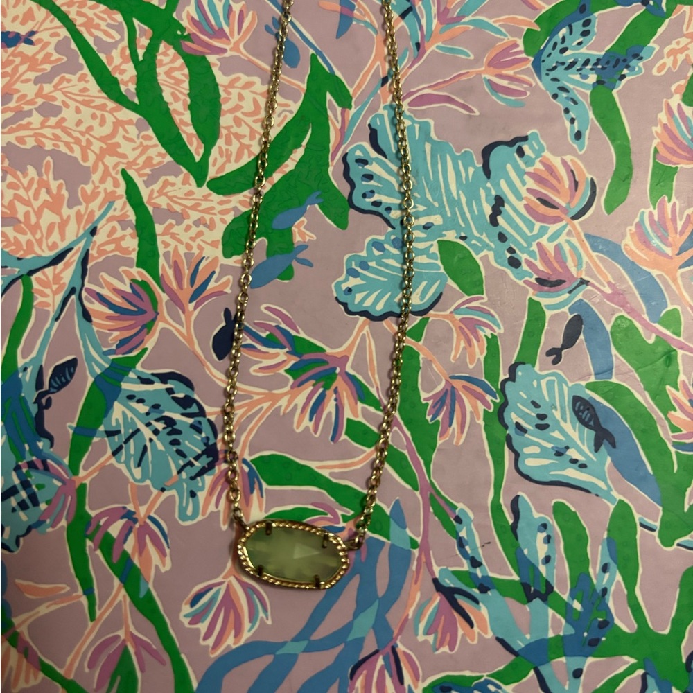 Elegant Gold Necklace with Green Pendant